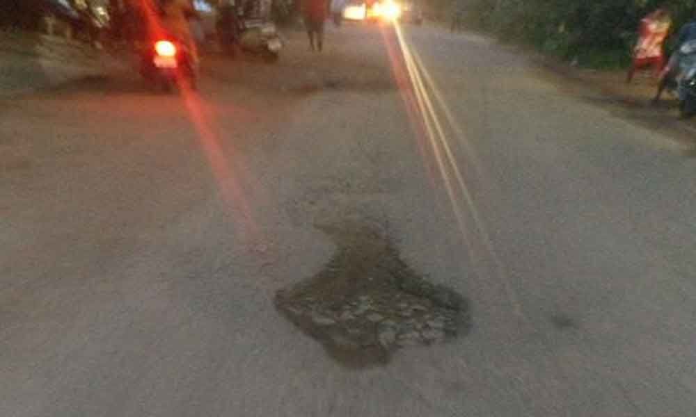 Locals irked over potholes at Bolarum