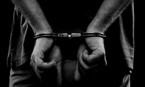 Man arrested for killing woman faces public wrath