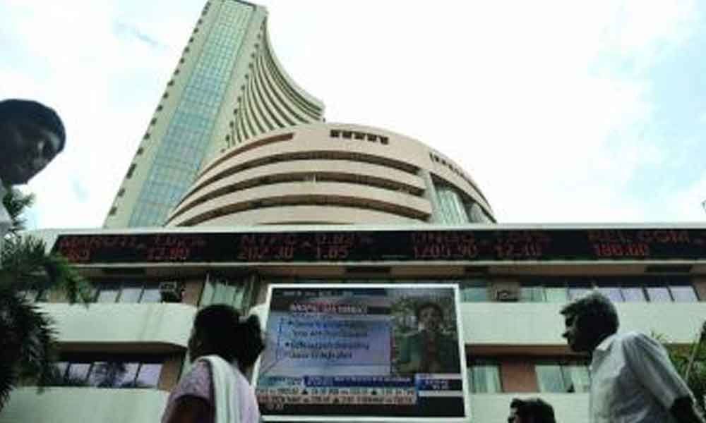 Sensex rallies over 250 points on global cues