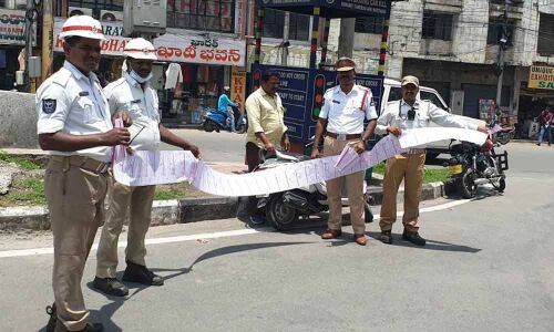 Vehicle rider made to pay for 57 challans