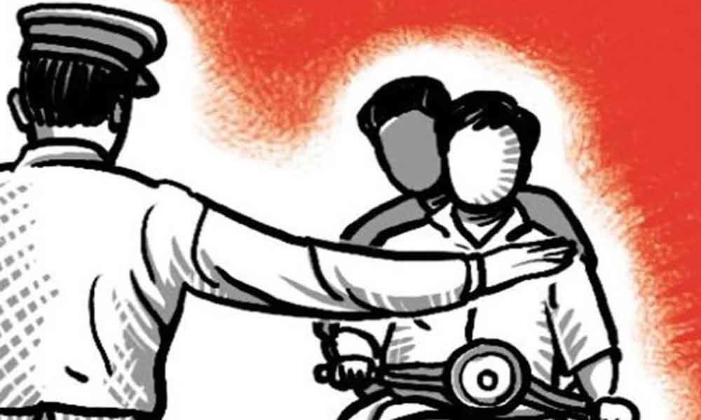 Electrician fined for riding without helmet, cuts power supply of police