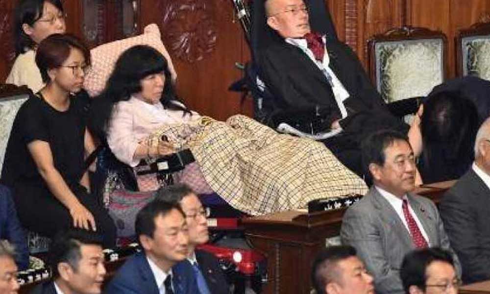 Lawmakers with serious disabilities take seats in Japan Parliament