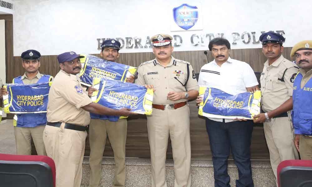 Jackets presented to Blue Colts, other cops