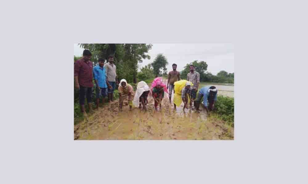 Locals struggle to walk on muddy road in Nizamabad