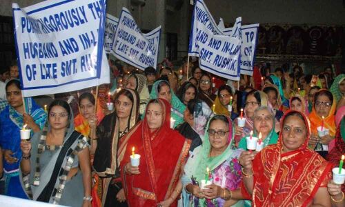 Candlelight march against dowry death