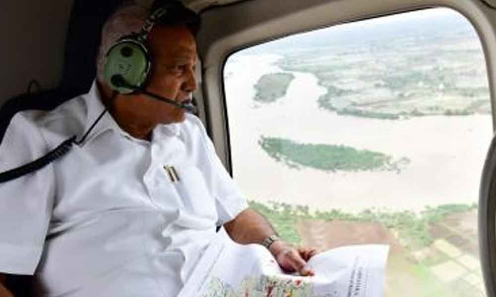 Karnataka CM Yediyurappa conducts aerial survey of flood-hit region