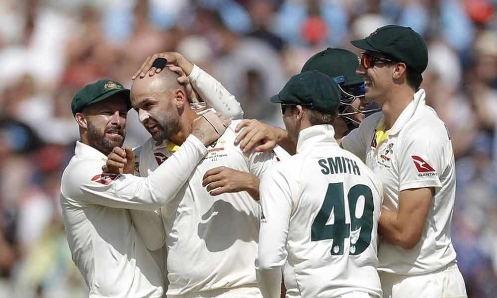 Lyon strikes as Australia press for victory in Ashes opener
