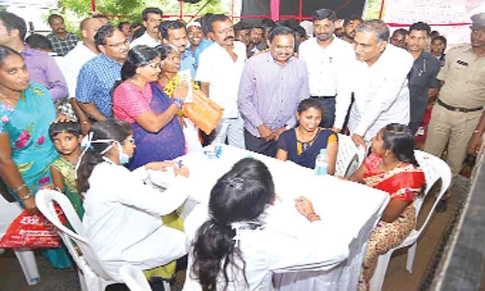 Harish Rao, Collector Venkatrama Reddy visit health camp