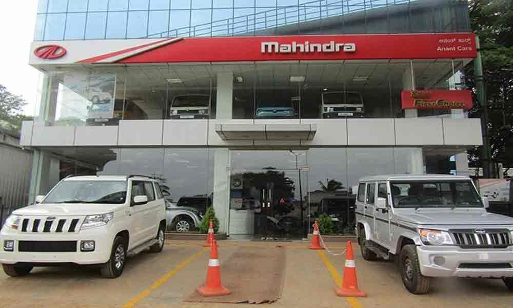 Low vehicle sales hit Mahindra & Mahindra profits