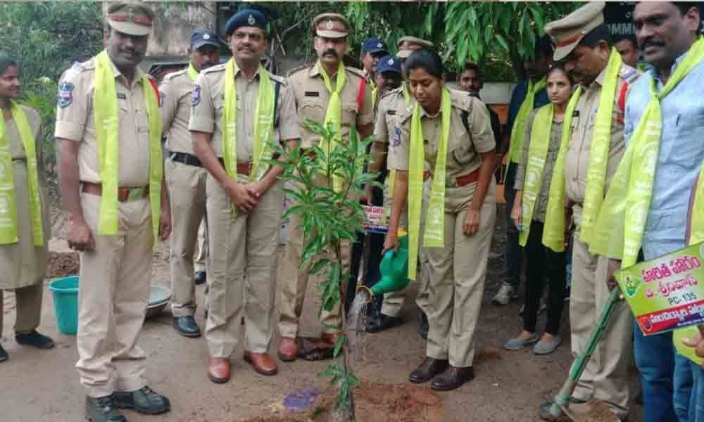 Cops plant saplings in Mancherial