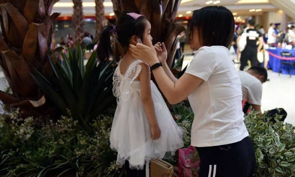Chinas child modelling industry booms amid controversy