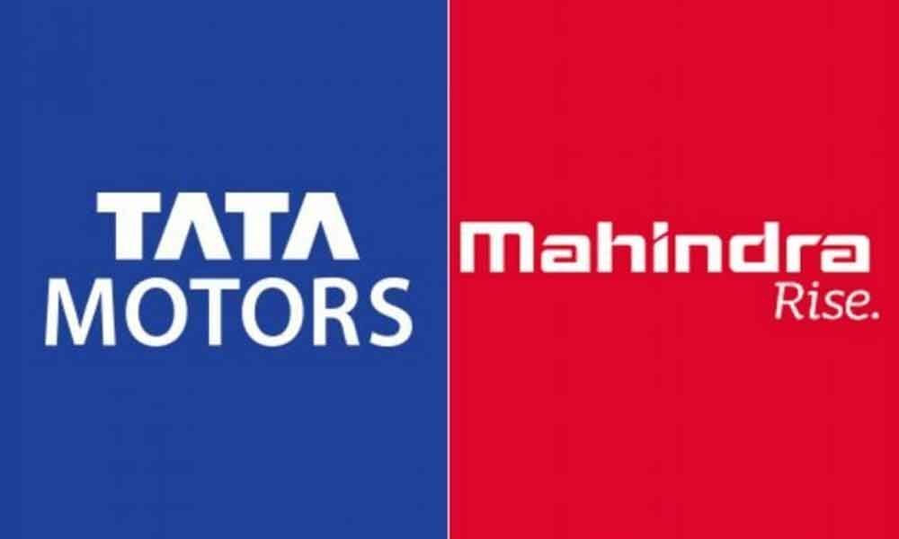 Tata Motors, M&M cut production