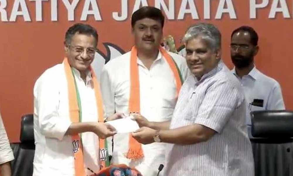 Nagar, Sanjay Seth join BJP after quitting SP