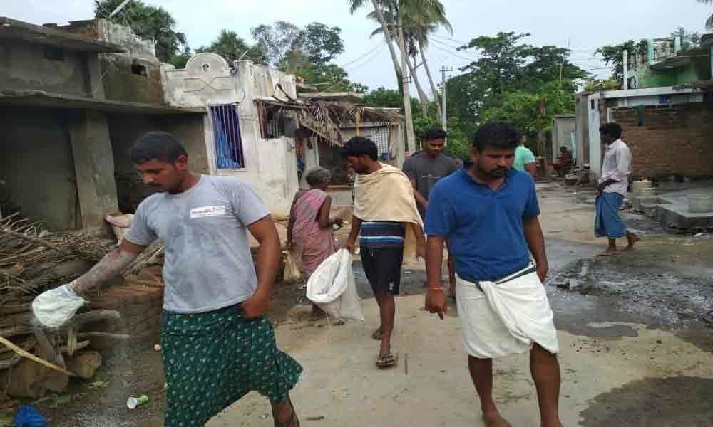 Youth take up cleanliness drive in flood-hit villages