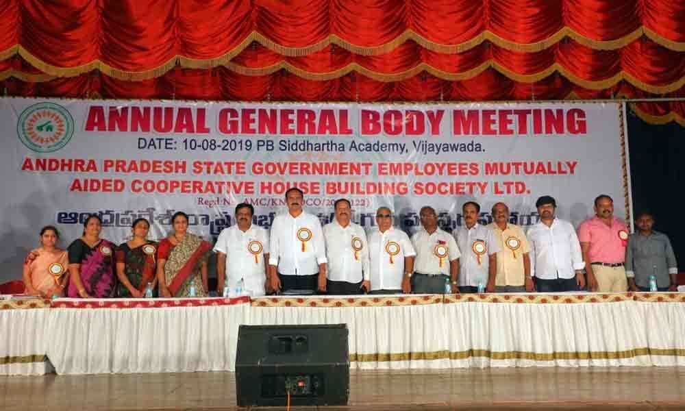 Government staff coop housing society holds annual meet at PB Siddhartha Auditorium
