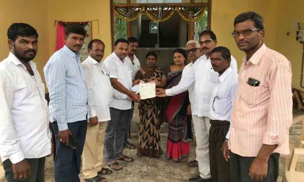 CM relief fund cheque distributed in Adilabad