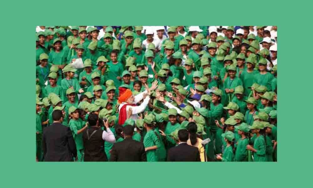 Children collect waste after Independence Day event at Red Fort