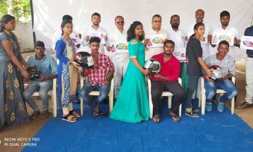 Girls gift helmet for safe journey in Nizamabad