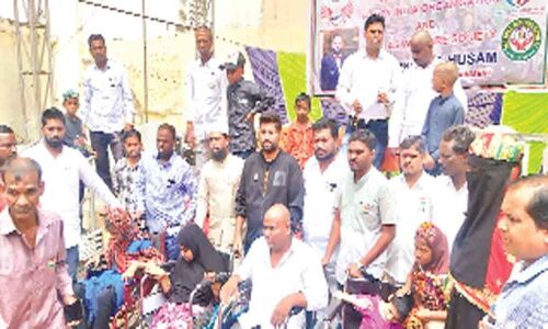 NGOs distribute free wheelchairs