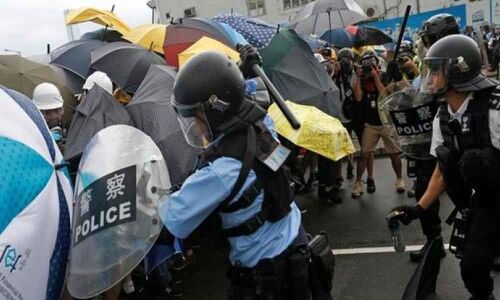 No need for China intervention, says bruised but unbowed Hong Kong police