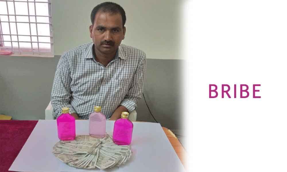 Day after getting best employee award, constable caught taking bribe at Mahbubnagar