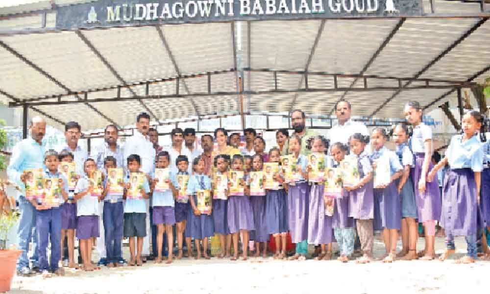Notebooks gifted by trust to students