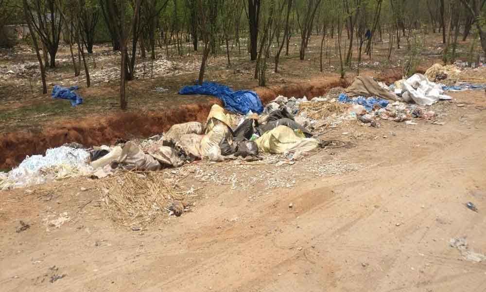 Garbage dumped at Kompally X Roads