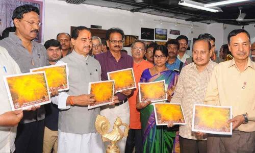 Speaker unveils photo exhibition in Vijayawada