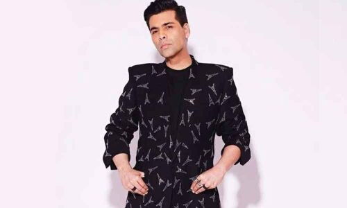 Karan Johar Sarcastic reply to a Troll Who Tweeted His Biopic Should Be Titled The Gay
