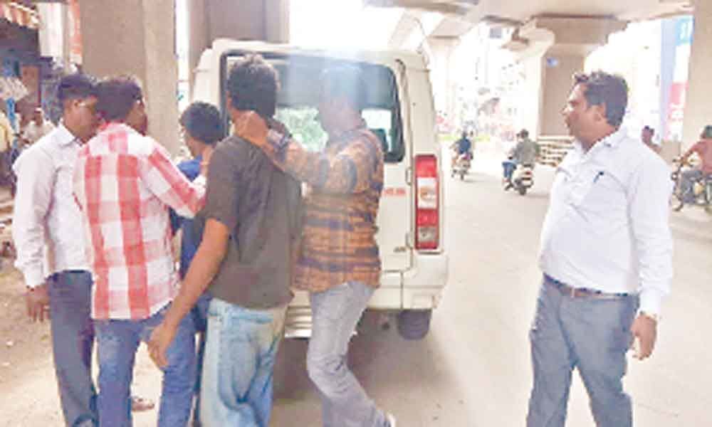 5 held for playing cards on road