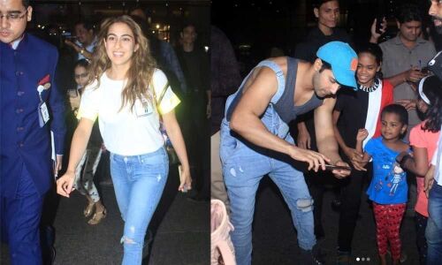 Sara Ali Khan and Varun Dhawan come back from Bangkok, click selfies with little fans at the airport terminal
