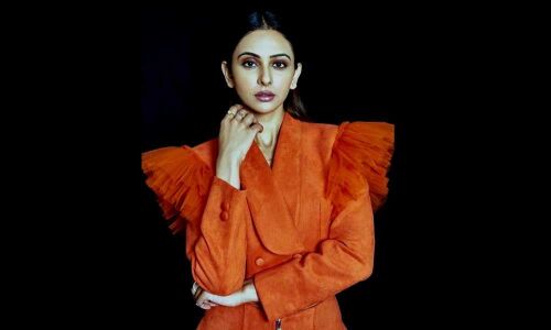 Rakul Preet Singh in Beautiful Orange dress for a CNBC Panel discussion