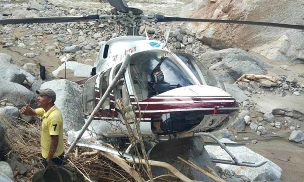 Chopper with relief material makes emergency landing