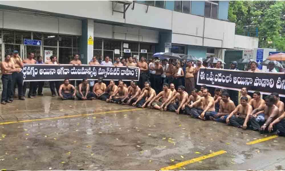 ITC workers stage half-naked protest seeking enhanced wages in Kothagudem