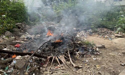 Residents fume over garbage burning