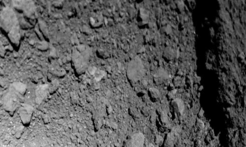 New images from asteroid probe offer clues on planet formation