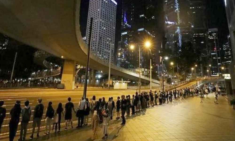 30 years after Baltic Way, Hong Kong protesters form human chain across city