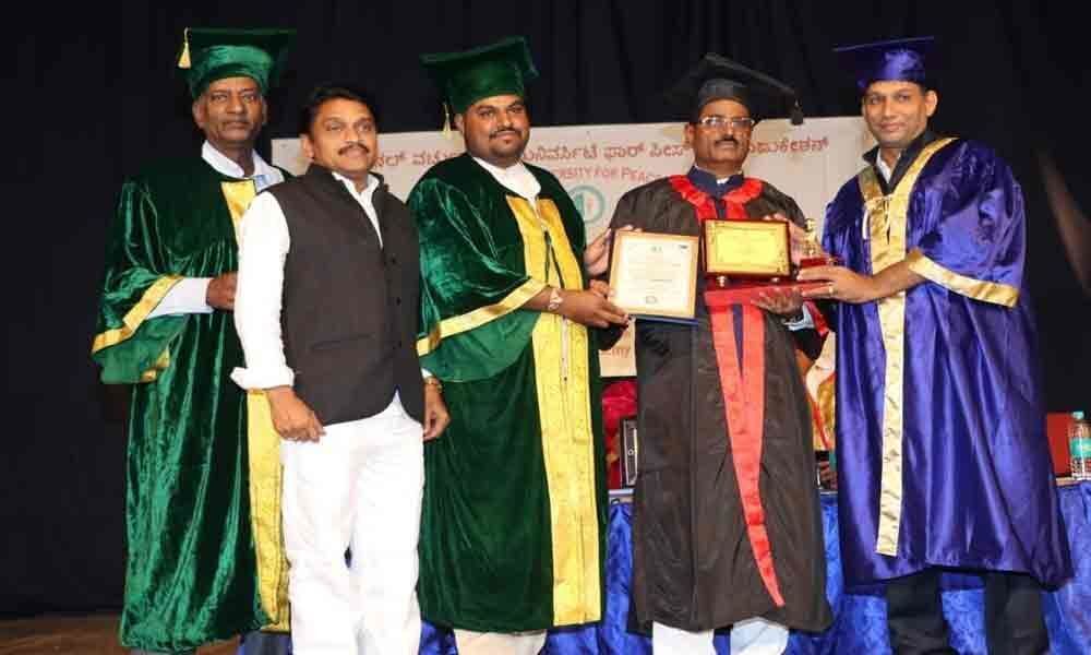 Doctorate for Ambedkar Global Law College Chairman Tirupati Reddy