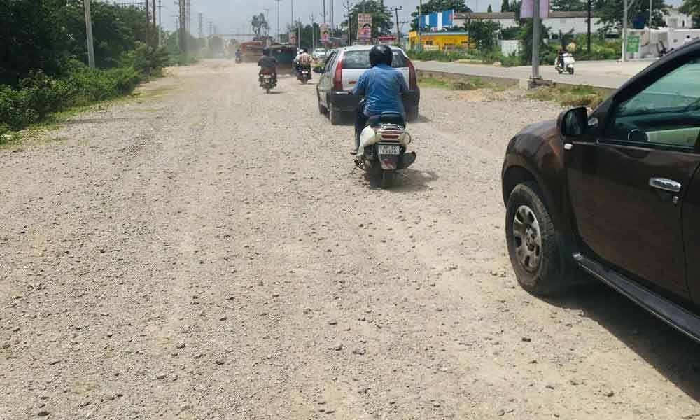 Suraram-Bahadurpally  road in a bad state