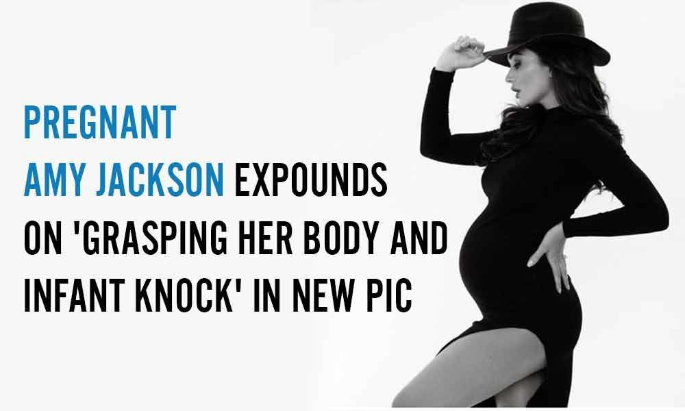 Pregnant Amy Jackson expounds on grasping her body and infant knock in new pic