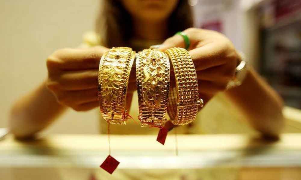 Gold touches new high over Rs 40K per 10gm