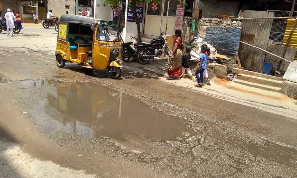 Bad roads turn worse as sewage overflows