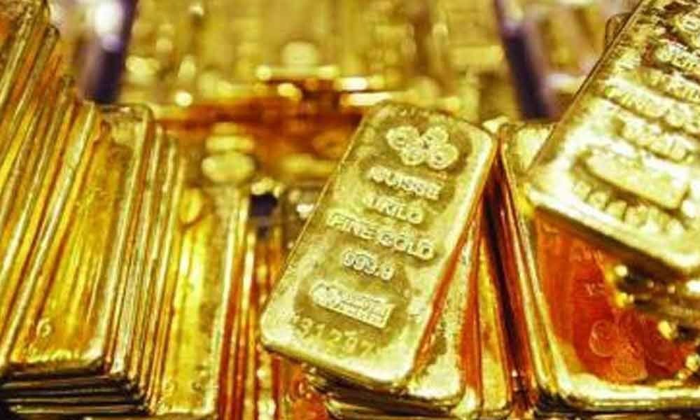 Gold rules flat at Rs 39,670