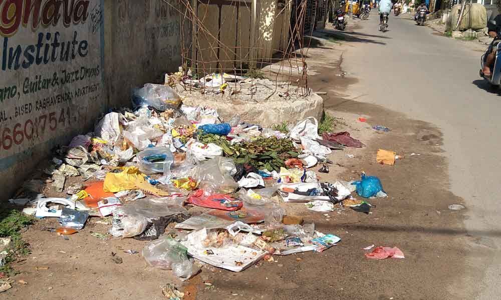 GHMC fails to clear garbage on road
