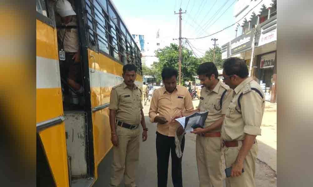 RTO inspects district school buses in Nizamabad