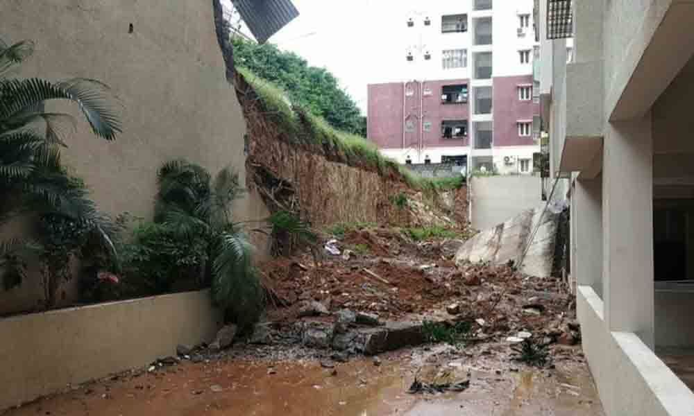 Kukatpally: Compound wall collapses; damages 4 parked cars