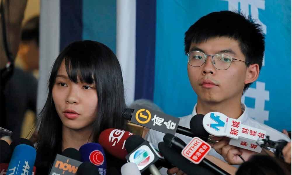 Hong Kong activists freed on bail, protest march banned