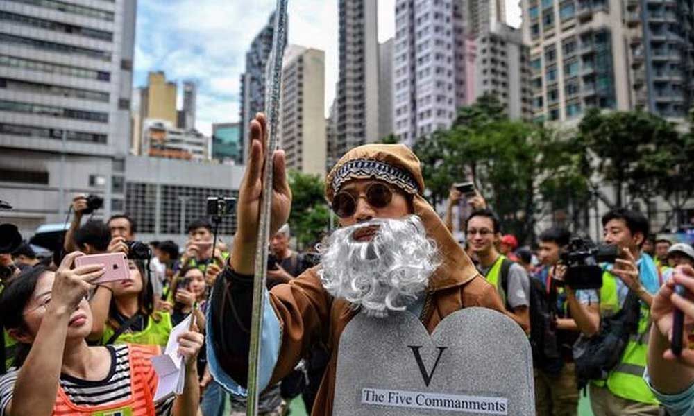 Hong Kong protesters defy rally ban after crackdown