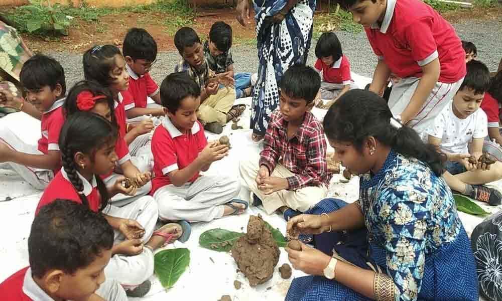 IDPS students pitch for use of clay Ganesha idols in Ongole
