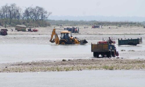 Illegal sand mining: 2 JCBS, 12 sand-filled trucks seized in East Godavari